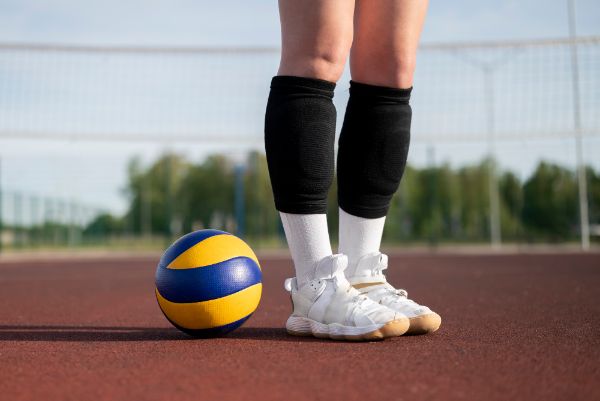 girl wearing volleyball shoes